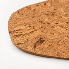 Macro close-up of Rounded Square Iceberg Natural cork placemat surface and thin 3 mm edge