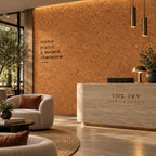 Salami cork wall tile shown in a conceptual hospitality reception visualization