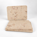 Stack of four Saphire cork placemats showing thin profile and rounded corners