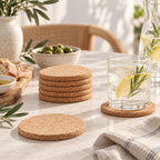Slim round cork coasters in a sunlit drinks table setting