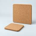 Square cork trivet, 9 mm, available in 15 × 15 cm and 20 × 20 cm — premium studio hero