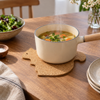 Squirrel-Shaped Cork Trivet used under a hot saucepan