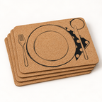 Stack of four Table Service cork placemats showing thin profile, rounded corners and printed motif