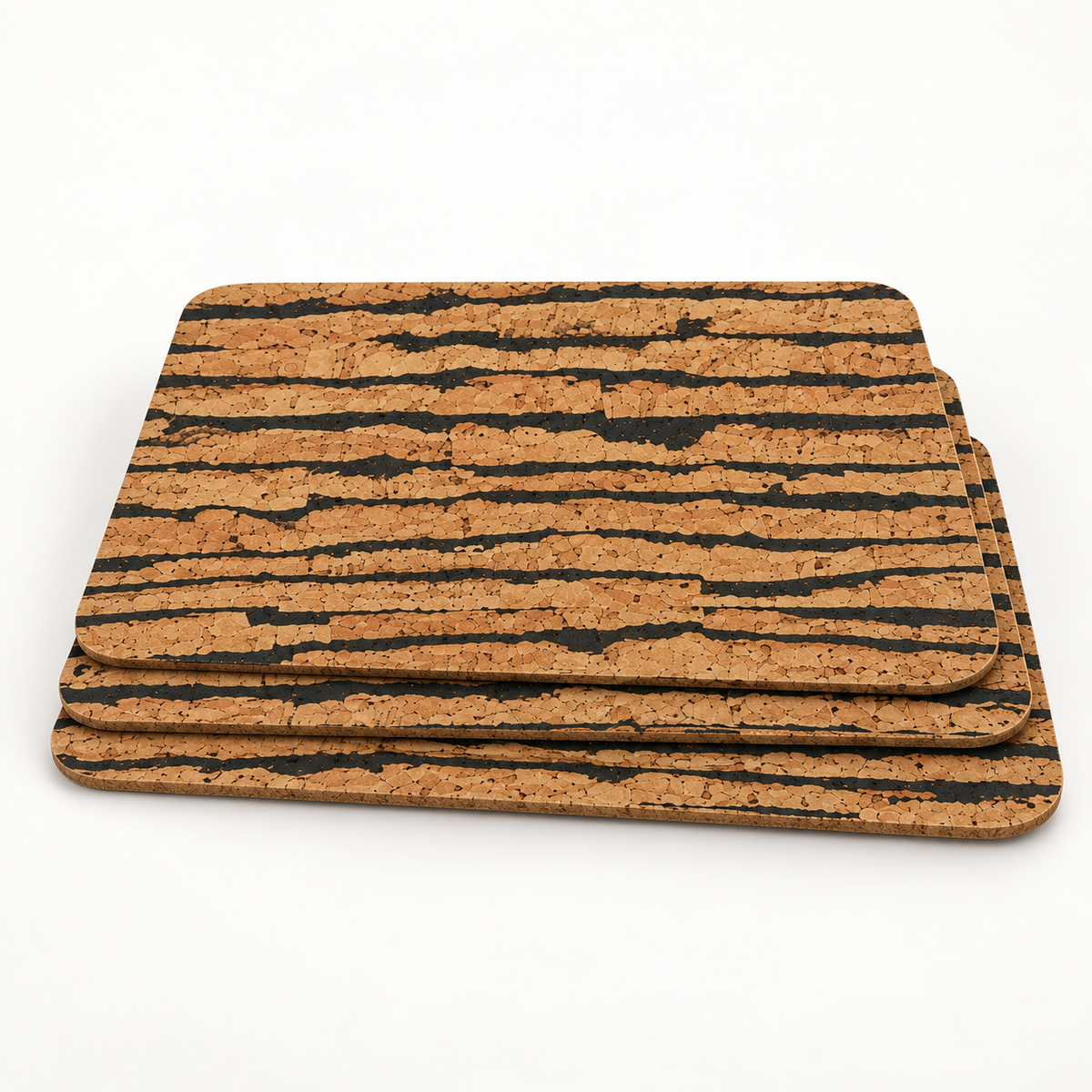 Stack of four Tiger cork placemats showing thin profile and rounded corners