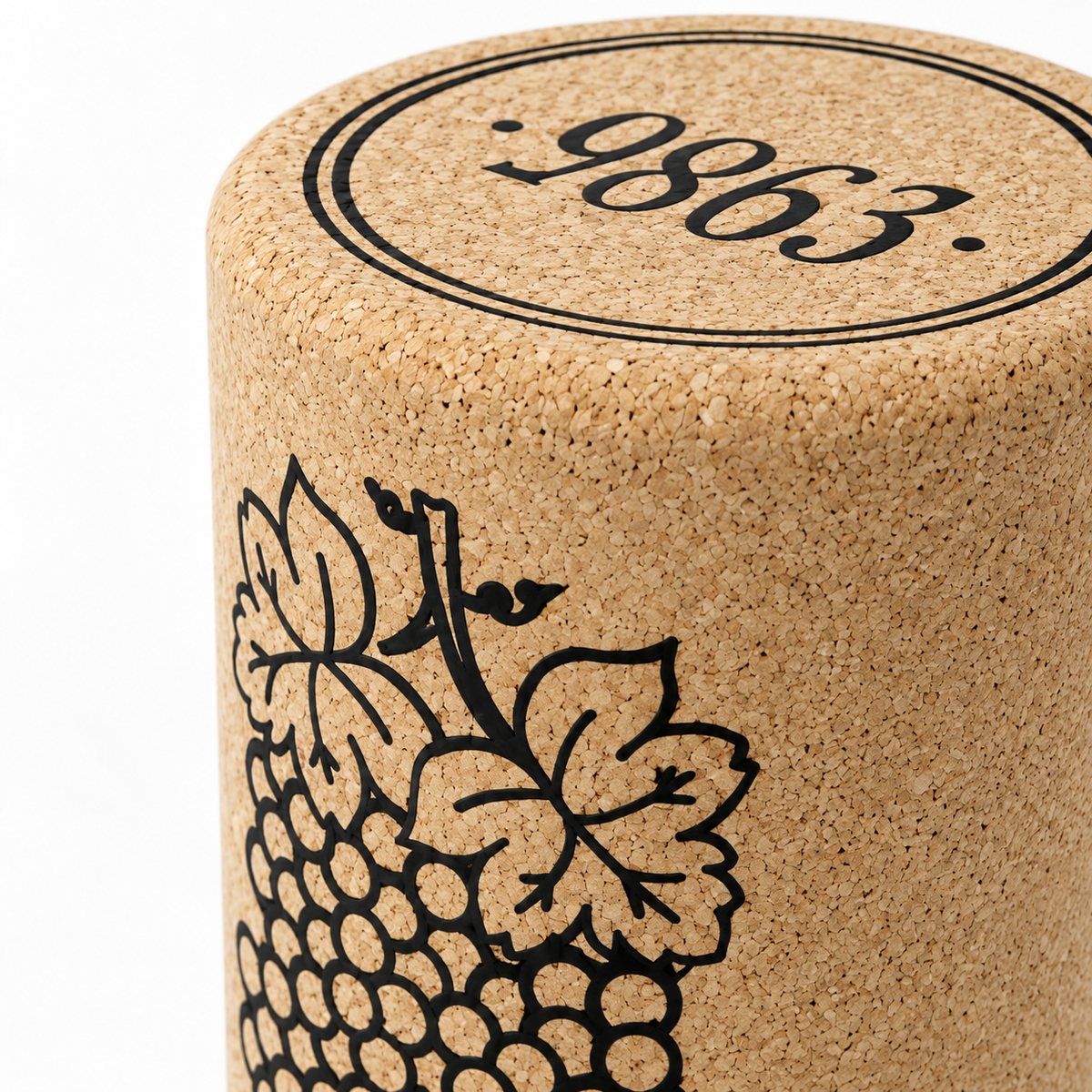 Macro detail of natural cork texture, grape motif and top marking on Wine Stopper Cork Stool